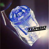 A close-up of the transparent blue Fleshlight Turbo Thrust Blowjob Simulator - Blue Ice emphasizes its textured design, showcasing it as a premium oral sex alternative. The brand name "Fleshlight" is prominently displayed, with the image well-lit to highlight the detailed features of this innovative pleasure device.